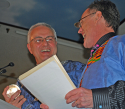 Father Dennis Dease, president of St. Thomas, received a “Partner in Hope Award” from Dennis Doyle, co-founder and board chairman of Hope For The City