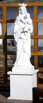 This marble statue of the Blessed Virgin Mary was recently carved in Italy and is now home in a landscaped terrace on the north side of Sitzmann Hall. 