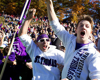 Cheers for the Tommies after breaking a 12-game losing streak against the Johnnies.