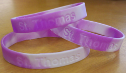 The purple and white wristbands will be sold in the upper quad today.