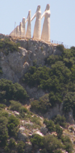 The Zalongo Monument sits atop a steep and rocky cliff in western Greece.