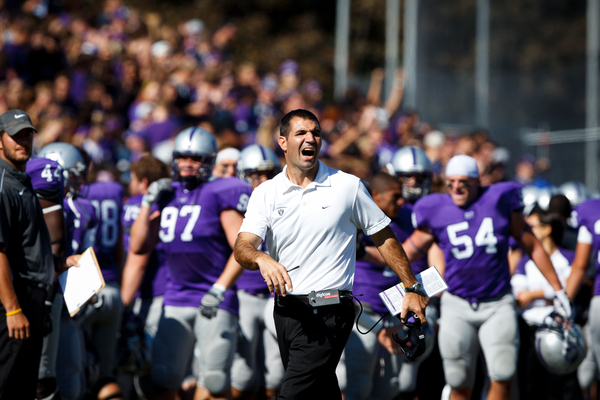 Coach Glenn Caruso, pictured here this fall urging his Tommies on against St. John’s University, has led the resurgence of St. Thomas football with four winning seasons, including undefeated MIAC seasons in 2010 and 2011, with one game remaining – Saturday at Carleton. The Division III Coach of the Year in 2010, he has compiled a 39-6 record here. St. Thomas defeated St. John’s University 63-7 on Oct. 1. / Photo by Mike Ekern.