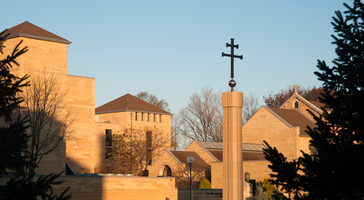 The St. Paul Seminary School of Divinity (SPSSOD) rooftops and cross are shown in the morning Autumn light. Photo taken on November 2, 2010.