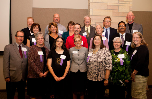 Top row, from left to right: Paul Provost, Minneapolis Campus Bookstore; Richard Lucius, Telecommunications; Lisa Dochniak, O’Shaughnessy-Frey Library; David Vang, Finance; Paul Strickland, Career Development Center; Jim Vincent, Economics. Middle row, from left to right: Mary Reichardt, Online Education; Lisa Burke, Opus College of Business Technology; Jim Waska, Campus Mail Services; Ann Johnson, Faculty Development Center; Bhabani Misra, Graduate Programs in Software. Bottom row, from left to right: David Jenkins, Saint Paul Seminary School of Divinity Music Ministry; Pat Sirek, President’s Office; Cathy Lutz, O’Shaughnessy-Frey Library; President Julie Sullivan, Brenda Ambe, Opus College of Business Records and Data Management; Sandra Menssen, Philosophy; Monica Dobihal, Physical Plant.