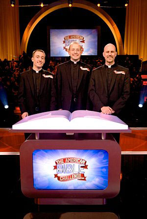 Three men from the St. Paul Seminary School of Divinity are pictured on the set of “The American Bible Challenge.” From the left are Deacon Marc Paveglio, Mark Pavlak and Chad VanHoose.