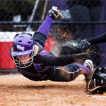 Chandran Duffy attempts to slide into home but is out during a softball game against Gustavus Adolphus College April 21, 2011 on the south athletic fields.  The Tommies won the double header 8-0 and 11-3.