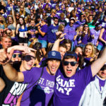 The crowd cheers for the camera during a football game against St. John's October 1, 2011 in O'Shaughnessy Stadium.  The Tommies won 63-7.