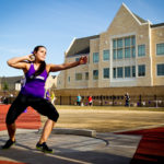 Allie Voigt throws in the shot put at the women's MIAC outdoor track and field championship on May 10, 2013 in O'Shaughnessy Stadium. (Photo by Mark Brown)