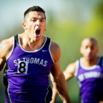 Cody Jerabek yells in triumph after winning a heat during the men's MIAC outdoor track and field championship on May 10, 2013 in O'Shaughnessy Stadium. (Photo by Mark Brown)