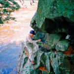 Lavin climbing the bluffs at St. Croix Falls.