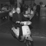 Lavin on a scooter during the dedication of "Scooter's" in Murray-Herrick Campus Center on Oct. 10, 1988.