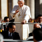 Pope Benedict XVI rides through St. Peter's square greeting congregants at a general audience.  (Mike Ekern/University of St. Thomas)