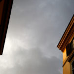 Apartment buildings frame a cloudy Roman sky.  (Mike Ekern/University of St. Thomas)