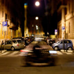 A motorcycle whips through the streets of Rome.  (Mike Ekern/University of St. Thomas)