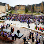 Students fill the John P. Monahan Plaza during a short program following the procession from the Arches to the Anderson Student Center. (Photo by Mike Ekern '02)