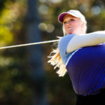 Erin Dingmann tees off during the women's golf MIAC Championship in Coon Rapids. (Photo by Mike Ekern '02)