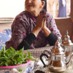 First Place, Intercultural Exchange: Photo by Angela Feyder, Marrakech, Morocco. “Berber grandmother preparing fresh mint tea.”