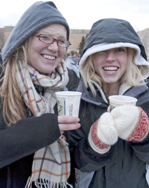 Students warming up with hot chocolate at the tree-lighting ceremony six years ago.