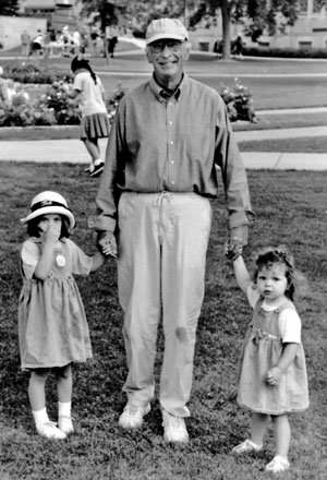 Paul Hague is pictured at the 1998 St. Thomas picnic for neighbors. With him are granddaughters Erin Rose Kessler and Emily Anne Kessler. 