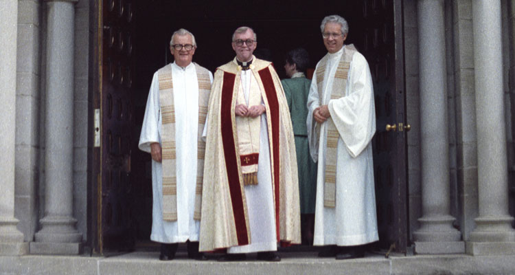 Father Charles Froehle, pictured at right in front of St. Mary's Chapel, was a major architect of the affiliation of the St. Paul Seminary and the then College of St. Thomas. He worked closely on the 1987 affiliation with the late Monsignor Terrence Murphy of St. Thomas, at left, and Archbishop John Roach.