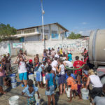St. Thomas students work with Healing Haiti, which delivers fresh water to Cite Soleil, a slum on the edge of Port-au-Prince.