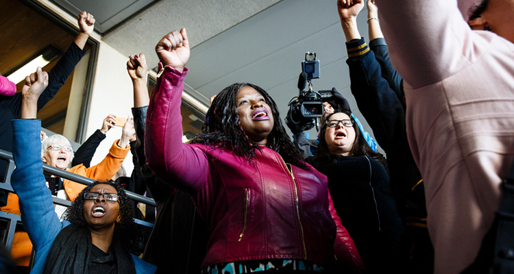 University of St. Thomas School of Law Professor Nekima Levy-Pounds (maroon jacket) is pictured after a court appearance at the Hennepin County District Court in Edina on March 10, 2015 with supporters from the Black Lives Matter organization. Levy-Pounds and other civil rights activists were protesting criminal trespassing charges brought against them by the county for a rally in December 2014 at the Mall of America.