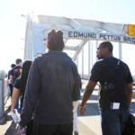 Excel! Research Scholars cross the Edmund Pettus Bridge in Selma, Alabama. Photo by Kathryn Hubly.