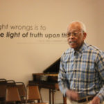 Mr. Hollis Watkins, 1960s civil rights activist and former member of the SNCC, speaks to the Excel! Scholars at the Smith Robertson Museum in Jackson, Mississippi. Photo by Kathryn Hubly.
