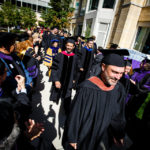 Communication and Journalism faculty member John Keston participates in a procession at the start of the President's Academic Convocation in Minneapolis.