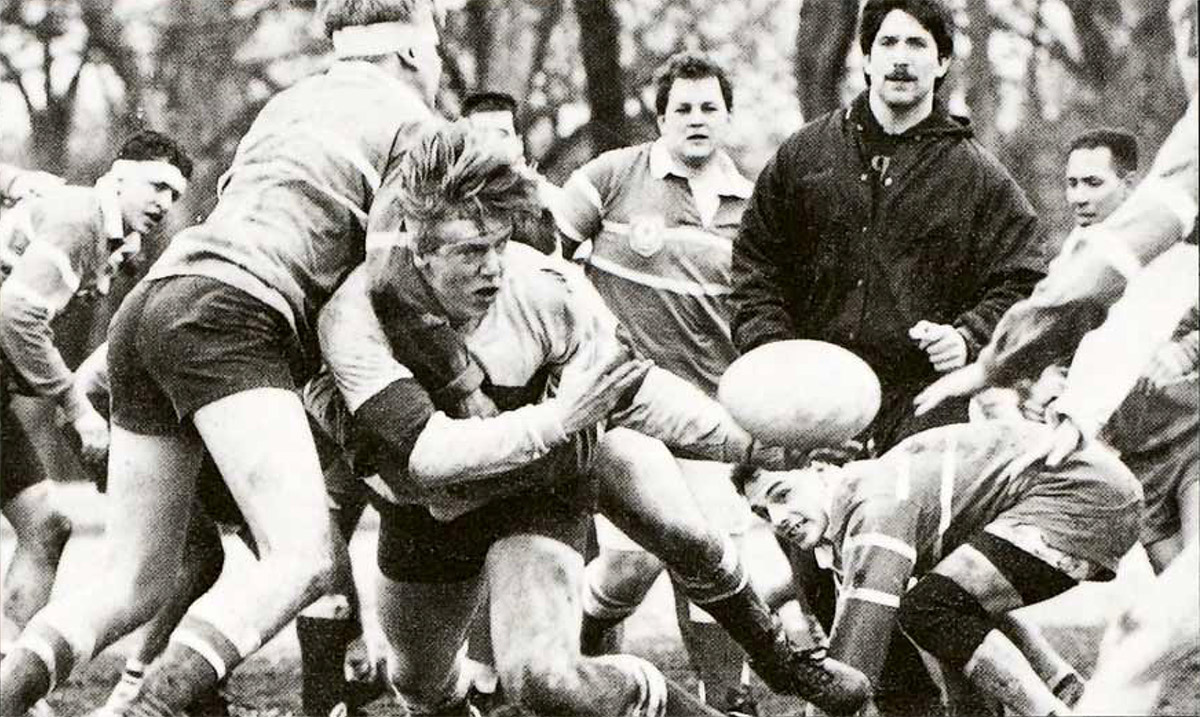 Senior John Murphy plays rugby in this 1990 Aquin file photo. (Photo by David Matenaer/The Aquin)