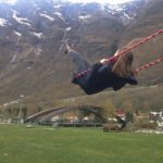 Honorable Mention, Tommies Abroad: Andrea Diamond, Flåm, Norway. "Swing to the Mountains: This photo was taken in Flåm, Norway, while I was on a travel break from school in Denmark. Our hostel was part of the small town tucked among the fjords, and we happened upon this little swing set while exploring on our first day. I felt like a kid again!"