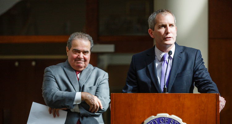 SOL Dean Robert Vischer introduces Supreme Court Justice Antonin Scalia at the Schulze Grand Atrium at the School of Law building in downtown Minneapolis on October 20, 2015.