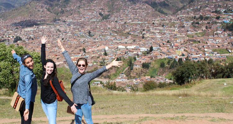 Rachel Weber, Erin Kern, and Hannah Tilstra posing above the city of Cusco. (Photos by Erin Kern)