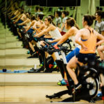 Students in a wellness living learning community participate in a spin class,