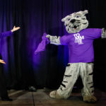 President Julie Sullivan and Tommie debut a new t-shirt at the event.