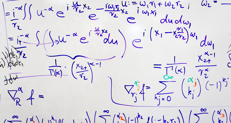 equations on whiteboard