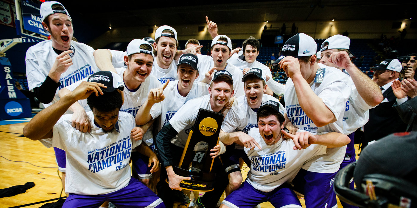 The Tommies pose with their trophy following the NCAA Division III men's basketball championship game March 19, 2016 at the Salem Civic Center in Salem, Va. The University of St. Thomas Tommies defeated the Benedictine University Eagles by a final score of 82-76.