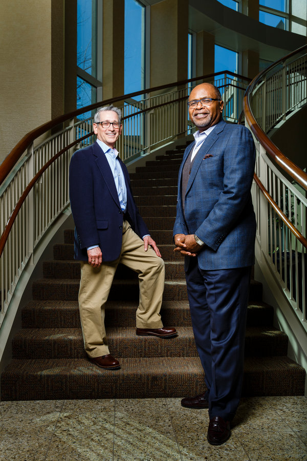 Douglas Jondle, left, research director at the Center for Ethical Business Cultures at the University of St. Thomas (CEBC) and Ron James, right, president and CEO of CEBC, pose for a portrait in Schulze Hall on March 1, 2016 in downtown Minneapolis.