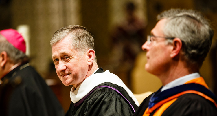 Blase Cupich, archbishop of the Archdiocese of Chicago, listens to a speech in the Chapel of St. Thomas Aquinas in St. Paul on May 11, 2016. Blase Cupich, Archbishop of the Diocese of Chicago, '71 (Philosophy) received an honorary degree from the University of St. Thomas.