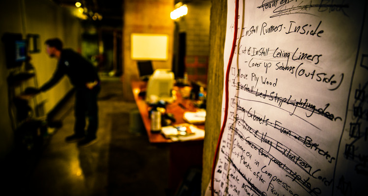 A task list taped to a wall is shown February 11, 2015 at the Minneapolis offices of Minnesota Ice Sculptures. The company was started by student Robbie Harrell (business).
