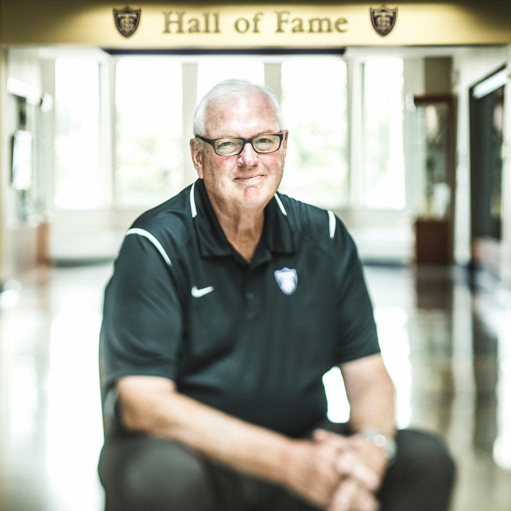 Athletic director Steve Fritz poses for a portrait August 17, 2016 near Anderson Athletic and Recreation Complex's Hall of Fame display. Taken for St. Thomas magazine.