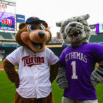 Tommie and T.C. Bear pose for a photo at Target Field.