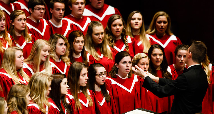 The Liturgical Choir performs during a dress rehearsal for the St. Thomas Christmas Concert December 6, 2015 at Orchestra Hall in Minneapolis.