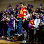 Fans cheer during a men's basketball game versus Saint John's University.