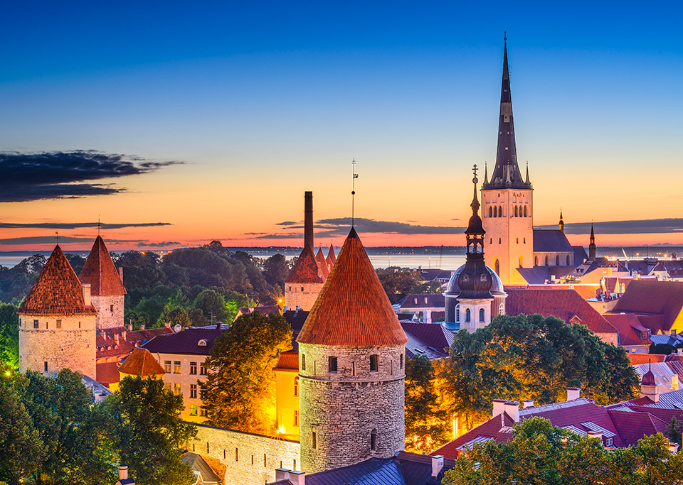 Tallinn, Estonia old city skyline at dawn.