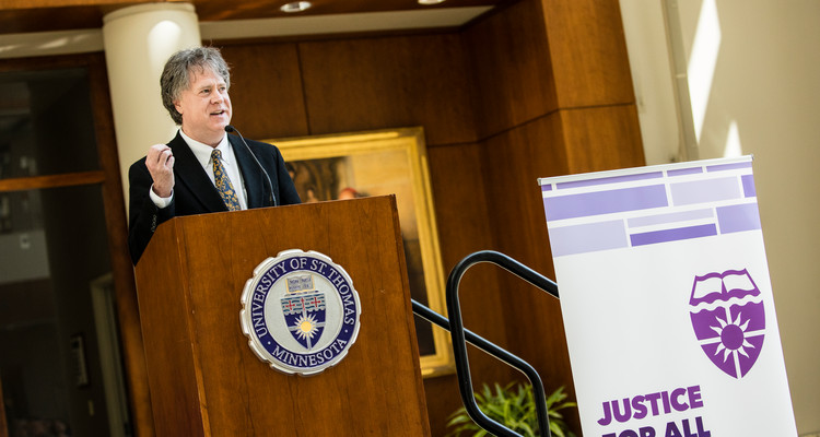 Mark Osler presents the award for Excellence in Professional Preparation during the University of St. Thomas School of Law Living the Mission Law Mission Award Ceremony in Schulze Atrium in the School of Law Building on April 11, 2017 in Minneapolis.