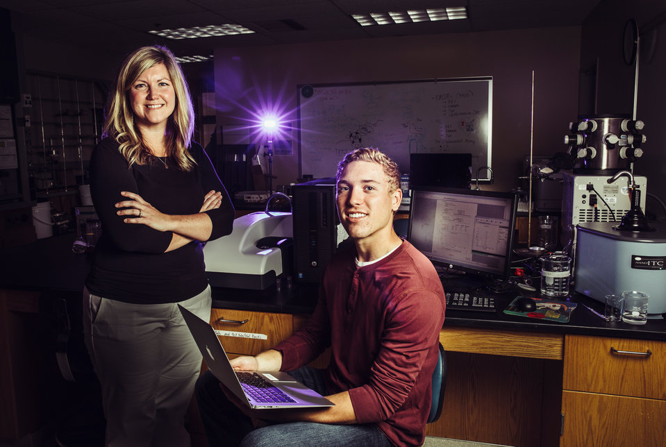 Chemistry professor Lisa Prevette and incoming freshman Jack Queenan pose for a photo in an Owens Science Hall lab on July 27, 2017 in St. Paul. Jack is a recent Minnetonka high school graduate who has been doing chemistry research with Lisa Prevette's lab since last year. This year he is leading his own research project where he's creating nanoparticles that will dissolve when in an acidic environment and will eventually be used to deliver insulin to the bodies of diabetics.