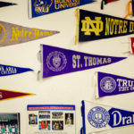 Cullen's St. Thomas pennant is displayed in the news room.