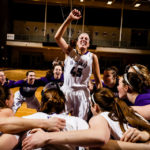 Kaitlin Langer and the the women's basketball team psych up before a game against Bethel University January 4, 2017 in Schoenecker Arena. The Tommies beat the Knights 71-62