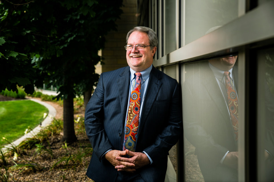 School of Law Professor Jerry Organ poses for a portrait in front of the School of Law Building in Minneapolis on July 19, 2017.